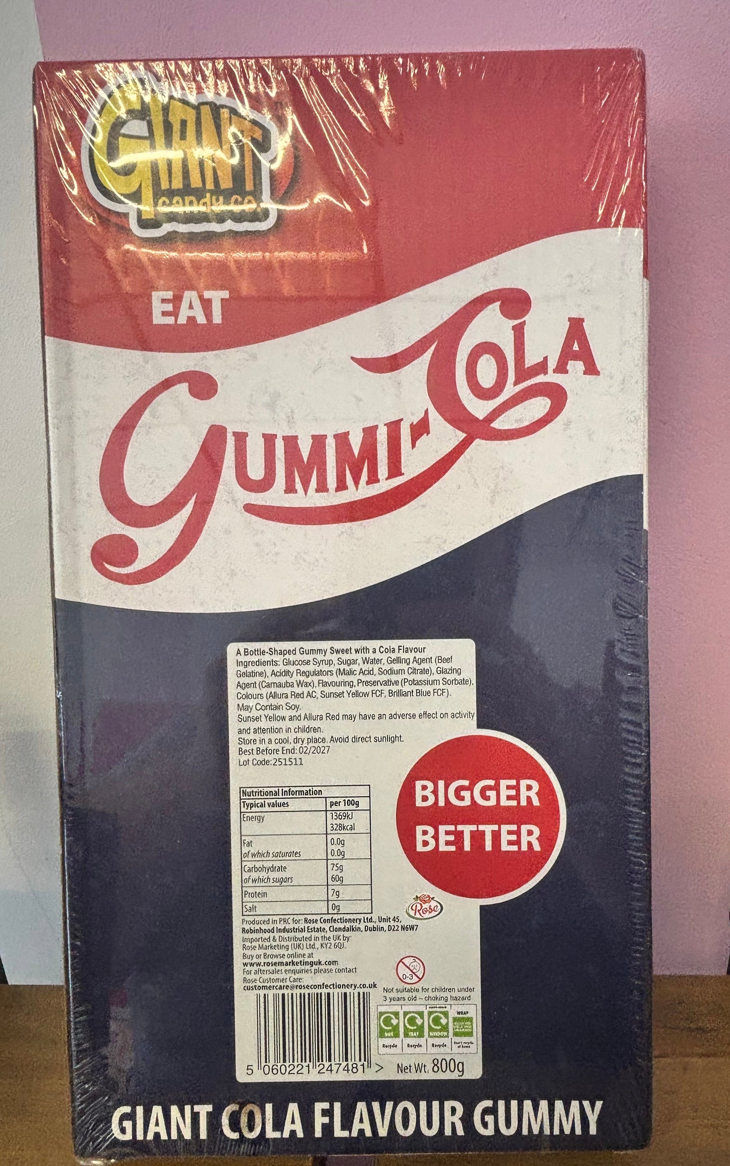 Coca-Cola Gummy package with visible branding on a surface.