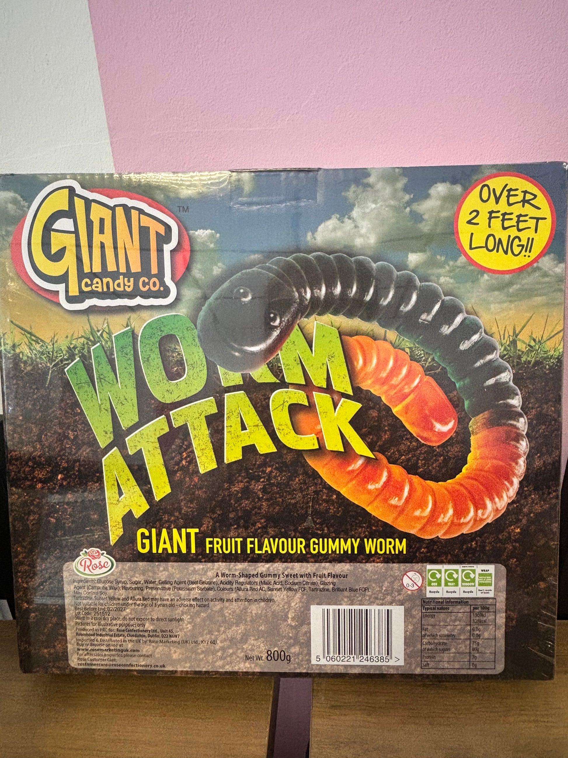 Box of Giant Fruit Flavour Gummy Worms with colorful design and text.